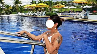 Curvy brazilian beauty relaxing poolside in a stunning bikini masked nomads