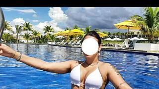 Curvy brazilian beauty relaxing poolside in a stunning bikini masked nomads