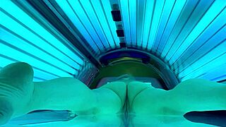 nude amateur enjoys public tanning bed session