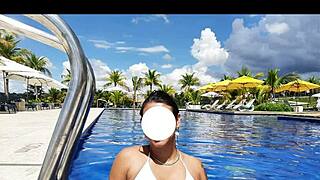 Curvy brazilian beauty relaxing poolside in a stunning bikini masked nomads