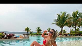 Curvy brazilian beauty relaxing poolside in a stunning bikini masked nomads