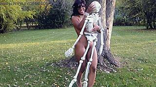 ebony milf dances naked with bones outdoors
