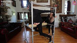 Whipping on wooden bondage for slave