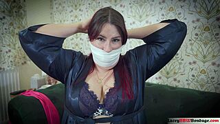 Lacey massively gags herself with pantyhose over her hood