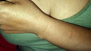 Asian woman relaxes alone showing her big natural tits