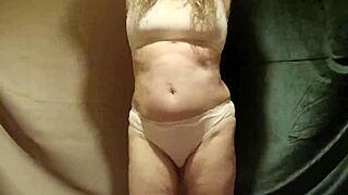 Esclave f does striptease then masturbates on camera