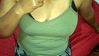 Asian woman relaxes alone showing her big natural tits
